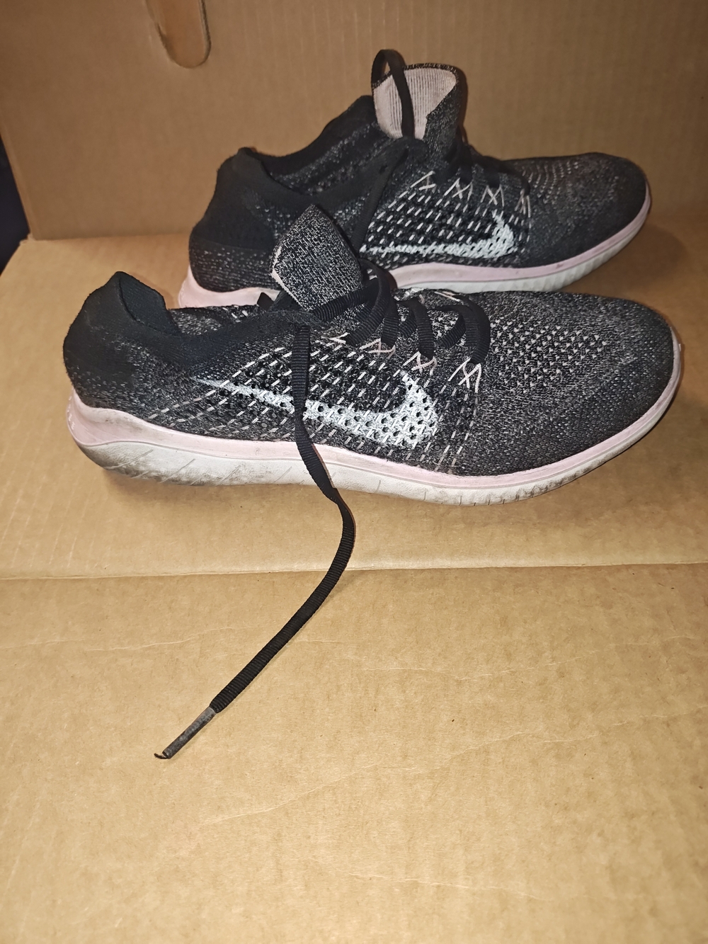 Nike Women's Black & Pink Flyknit Training Sneakers